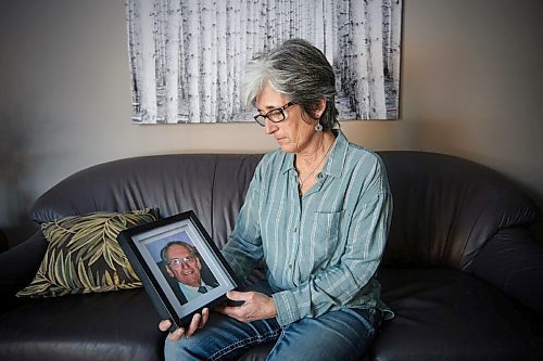 JOHN WOODS / WINNIPEG FREE PRESS
Lisa Prost holds a photo of her father Murray Balagus, 91, in her home in Winnipeg Tuesday, January 26, 2021. Balagus died last Thursday while being a resident at Maples Personal Care Home and Prost is calling attention to the standards inside the home.

Reporter: May