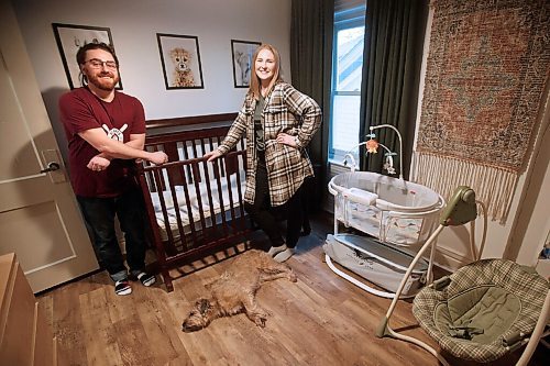 JOHN WOODS / WINNIPEG FREE PRESS
Rory and Lisa McDonald and Ozzie are photographed at their home in Winnipeg Wednesday, January 27, 2021. The MacDonalds are expecting their baby by surrogate during the pandemic.

Reporter: Jen