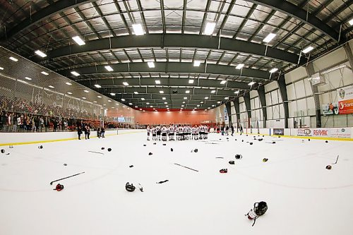 JOHN WOODS / WINNIPEG FREE PRESS
The aftermath as College Beliveau Barracudas defeat the Glenlawn Lions in the Winnipeg High School Hockey League B Division at Seven Oaks Arena  in Winnipeg Thursday, March 12, 2020. 

Reporter: For a COVID-19 feature by Sawatsky - other game photos in Merlin from game day