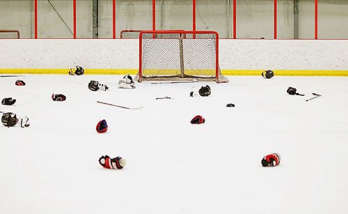 JOHN WOODS / WINNIPEG FREE PRESS
The aftermath as College Beliveau Barracudas defeat the Glenlawn Lions in the Winnipeg High School Hockey League B Division at Seven Oaks Arena  in Winnipeg Thursday, March 12, 2020. 

Reporter: For a COVID-19 feature by Sawatsky - other game photos in Merlin from game day