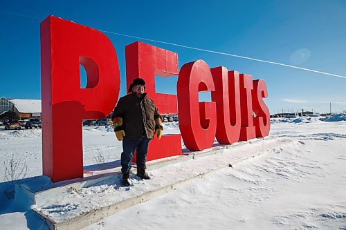 MIKE DEAL / WINNIPEG FREE PRESS
Chief Glen Hudson beside the large Peguis sign that sits at the heart of the community outside the health centre and the shopping centre.
210127 - Wednesday, January 27, 2021.