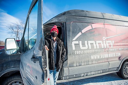 MIKAELA MACKENZIE / WINNIPEG FREE PRESS

Trevor Froese, owner of Runnin' Red, poses for a portrait at the business in Emerson, Manitoba on Wednesday, Jan. 27, 2021. For JS story.

Winnipeg Free Press 2021