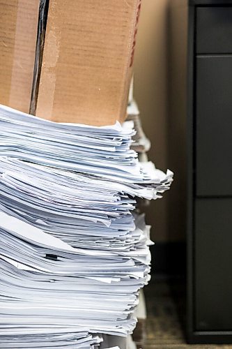 MIKAELA MACKENZIE / WINNIPEG FREE PRESS

Customs papers pile up in Trevor Froese's office at Runnin' Red in Emerson, Manitoba on Wednesday, Jan. 27, 2021. For JS story.

Winnipeg Free Press 2021