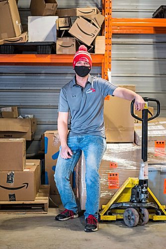 MIKAELA MACKENZIE / WINNIPEG FREE PRESS

Trevor Froese, owner of Runnin' Red, poses for a portrait in one of their warehouses in Emerson, Manitoba on Wednesday, Jan. 27, 2021. For JS story.

Winnipeg Free Press 2021