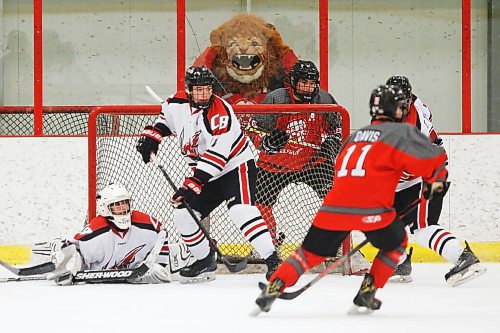 JOHN WOODS / WINNIPEG FREE PRESS
College Beliveau Barracudas (white) defeat the Glenlawn Lions (red) in the Winnipeg High School Hockey League B Division at Seven Oaks Arena  in Winnipeg Thursday, March 12, 2020. 

Reporter: For a COVID-19 feature by Sawatsky - other game photos in Merlin from game day