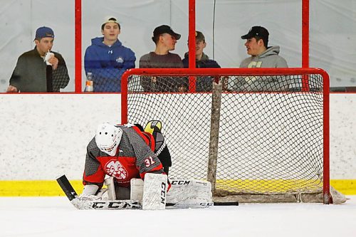 JOHN WOODS / WINNIPEG FREE PRESS
College Beliveau Barracudas (white) defeat the Glenlawn Lions (red) in the Winnipeg High School Hockey League B Division at Seven Oaks Arena  in Winnipeg Thursday, March 12, 2020. 

Reporter: For a COVID-19 feature by Sawatsky - other game photos in Merlin from game day