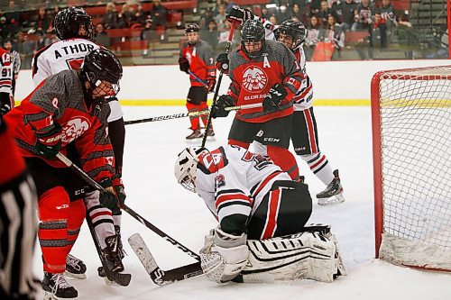 JOHN WOODS / WINNIPEG FREE PRESS
College Beliveau Barracudas (white) defeat the Glenlawn Lions (red) in the Winnipeg High School Hockey League B Division at Seven Oaks Arena  in Winnipeg Thursday, March 12, 2020. 

Reporter: For a COVID-19 feature by Sawatsky - other game photos in Merlin from game day