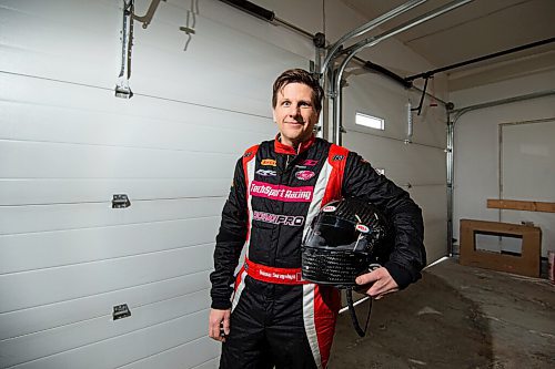 MIKE SUDOMA / WINNIPEG FREE PRESS
Race Car Driver, Damon Surzyshyn wears his racing suit as he chats about racing during the pandemic in his garage Thursday afternoon
January 28, 2021
