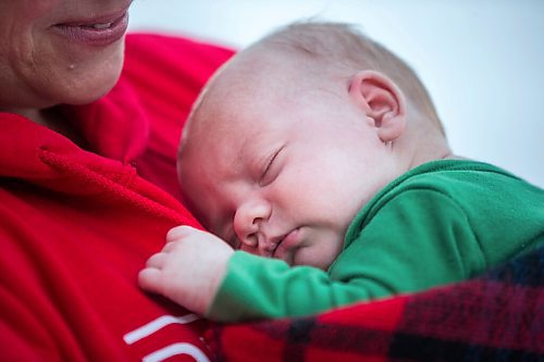 MIKAELA MACKENZIE / WINNIPEG FREE PRESS

Katie German and her one-month-old baby, Jasper Wiess, pose for a portrait in Winnipeg on Thursday, Jan. 28, 2021. For Jen Zoratti story.

Winnipeg Free Press 2021