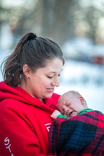 MIKAELA MACKENZIE / WINNIPEG FREE PRESS

Katie German and her one-month-old baby, Jasper Wiess, pose for a portrait in Winnipeg on Thursday, Jan. 28, 2021. For Jen Zoratti story.

Winnipeg Free Press 2021