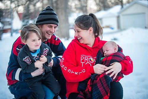 MIKAELA MACKENZIE / WINNIPEG FREE PRESS

Felix Wiess (five, left), Travis Wiess, and Katie German pose for a portrait with one-month-old Jasper Wiess, the new pandemic addition to the family, in Winnipeg on Thursday, Jan. 28, 2021. For Jen Zoratti story.

Winnipeg Free Press 2021