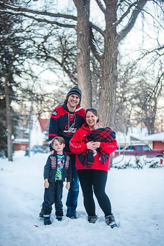 MIKAELA MACKENZIE / WINNIPEG FREE PRESS

Felix Wiess (five, left), Travis Wiess, and Katie German pose for a portrait with one-month-old Jasper Wiess, the new pandemic addition to the family, in Winnipeg on Thursday, Jan. 28, 2021. For Jen Zoratti story.

Winnipeg Free Press 2021