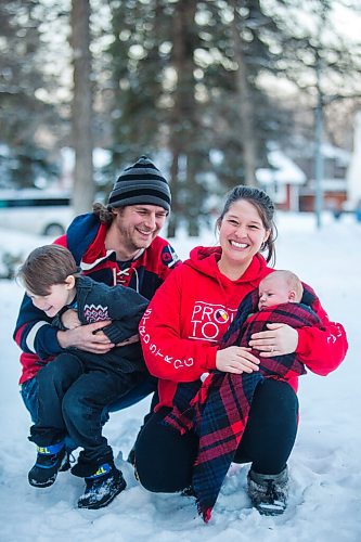 MIKAELA MACKENZIE / WINNIPEG FREE PRESS

Felix Wiess (five, left), Travis Wiess, and Katie German pose for a portrait with one-month-old Jasper Wiess, the new pandemic addition to the family, in Winnipeg on Thursday, Jan. 28, 2021. For Jen Zoratti story.

Winnipeg Free Press 2021