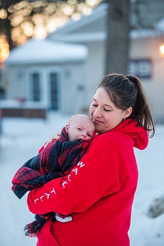 MIKAELA MACKENZIE / WINNIPEG FREE PRESS

Katie German and her one-month-old baby, Jasper Wiess, pose for a portrait in Winnipeg on Thursday, Jan. 28, 2021. For Jen Zoratti story.

Winnipeg Free Press 2021