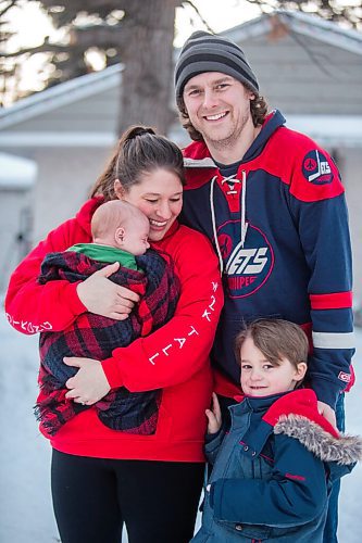 MIKAELA MACKENZIE / WINNIPEG FREE PRESS

Katie German (left), Travis Wiess, and Felix Wiess (five) pose for a portrait with one-month-old Jasper Wiess, the new pandemic addition to the family, in Winnipeg on Thursday, Jan. 28, 2021. For Jen Zoratti story.

Winnipeg Free Press 2021