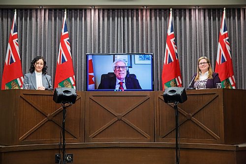 MIKE DEAL / WINNIPEG FREE PRESS
Conservation and Climate Minister Sarah Guillemard (right) and Colleen Kuruluk, chief executive officer, Efficiency Manitoba (left) flank a virtual Jim Carr, special representative for the Prairies, and member of Parliament, Winnipeg South Centre, while he announces the Canadian government will be putting forward approximately $32.3 million from the Low Carbon Economy Leadership Fund to support natural gas reduction programs offered by Efficiency Manitoba, a new Crown corporation established by the government of Manitoba.
210129 - Friday, January 29, 2021.