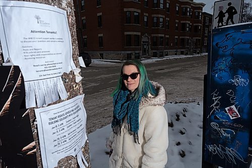 JESSE BOILY  / WINNIPEG FREE PRESS
Ella Rockar, WBCOs housing coordinator who has been reaching out to West Broadway Residents organizing workshops to help explain  tenants rights, poses next to one of the WCBO posters on Westminster Ave. in the West Broadway neighbourhood on Friday. Friday, Jan. 29, 2021.
Reporter: Ben Waldman