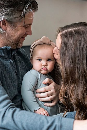 MIKAELA MACKENZIE / WINNIPEG FREE PRESS

Jordan Cieciwa, Tess Klachefsky, and their baby, Betty, pose for a portrait in their home in Winnipeg on Friday, Jan. 29, 2021. For Jen Zoratti story.

Winnipeg Free Press 2021