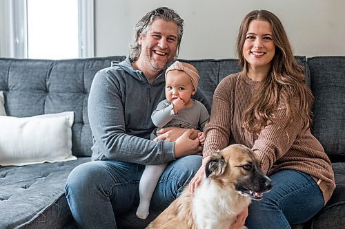 MIKAELA MACKENZIE / WINNIPEG FREE PRESS

Jordan Cieciwa, Tess Klachefsky, and their baby, Betty, pose for a portrait in their home in Winnipeg on Friday, Jan. 29, 2021. For Jen Zoratti story.

Winnipeg Free Press 2021