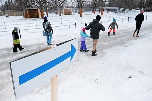 Daniel Crump / Winnipeg Free Press. Signs at the Winnipeg Zoo help guide visitors in a unidirectional loop around the exhibits to help people social distance. January 30, 2021.