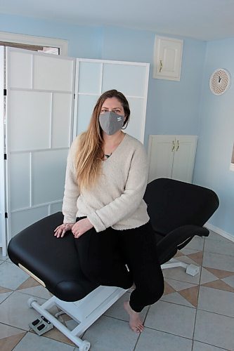 Canstar Community News Christine McInnis sits in her clinic at 28 Kemper Cres. in Headingley on Jan. 27. McInnis has been a reflexologist for five years. (GABRIELLE PICHÉ/CANSTAR COMMUNITY NEWS/HEADLINER)