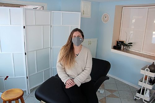 Canstar Community News Christine McInnis sits in her clinic at 28 Kemper Cres. in Headingley on Jan. 27. McInnis has been a reflexologist for five years. (GABRIELLE PICHÉ/CANSTAR COMMUNITY NEWS/HEADLINER)