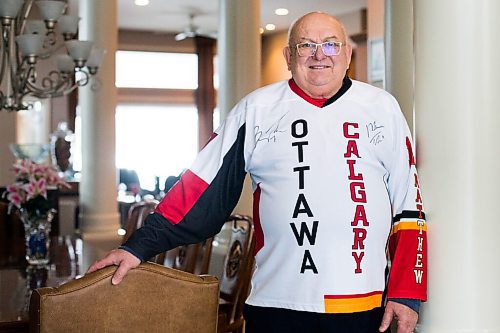 MIKAELA MACKENZIE / WINNIPEG FREE PRESS

Don Oster, proud Winnipeg grandpa of Matthew and Brady Tkachuk, poses for a portrait in his hybrid Calgary/Ottawa jersey in Winnipeg on Monday, Feb. 1, 2021. For --- story.

Winnipeg Free Press 2021