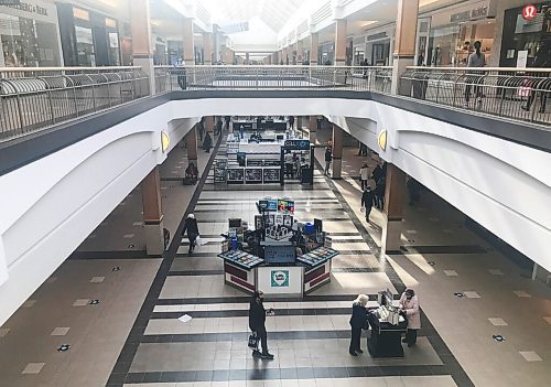 MIKE DEAL / WINNIPEG FREE PRESS
Shoppers are greeted with hand sanitizer and signs advising on the number of people allowed inside most of the stores at Polo Park Shopping Centre Tuesday afternoon.
210202 - Tuesday, February 02, 2021.