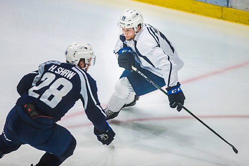 MIKAELA MACKENZIE / WINNIPEG FREE PRESS

Westin Michaud (right) faces Hayden Shaw at Manitoba Moose practice at the Bell MTS Iceplex in Winnipeg on Tuesday, Feb. 2, 2021. For Mike Sawatzky story.

Winnipeg Free Press 2021