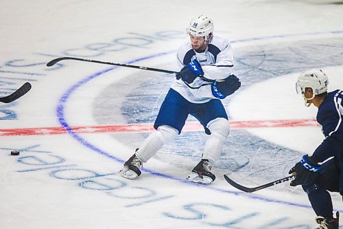 MIKAELA MACKENZIE / WINNIPEG FREE PRESS

Westin Michaud (16) does some fancy stick work at Manitoba Moose practice at the Bell MTS Iceplex in Winnipeg on Tuesday, Feb. 2, 2021. For Mike Sawatzky story.

Winnipeg Free Press 2021