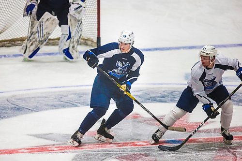 MIKAELA MACKENZIE / WINNIPEG FREE PRESS

Jeff Malott (left) and Nicholas Jones watch the puck at Manitoba Moose practice at the Bell MTS Iceplex in Winnipeg on Tuesday, Feb. 2, 2021. For Mike Sawatzky story.

Winnipeg Free Press 2021