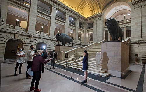 MIKE DEAL / WINNIPEG FREE PRESS
MLA Malaya Marcelino, the Manitoba NDP critic for Immigration and the Status of Women, speaks to reporters at the foot of the grand staircase in the Manitoba Legislative building Tuesday afternoon.
210202 - Tuesday, February 02, 2021.
