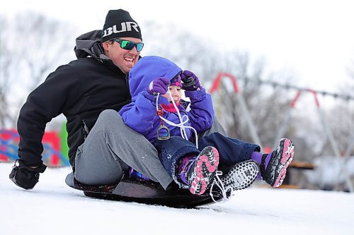 RUTH BONNEVILLE / WINNIPEG FREE PRESS 

Standup - Marc Lanthier enjoys his lunch hour as he  toboggans with his daughter, Jordyn (5yrs) at Happyland park Tuesday.



Feb 02, 2021