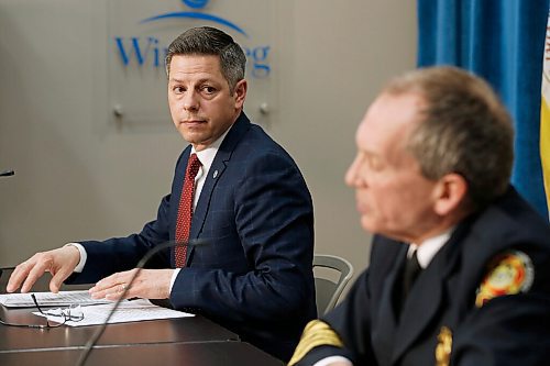 JOHN WOODS / WINNIPEG FREE PRESS
Mayor Brian Bowman listens in as Chief John Lane, Winnipeg Fire and Paramedic Service (WFPS) speaks to media to address reports of racism within the WFPS in Winnipeg Wednesday, February 3, 2021. 

Reporter: ?