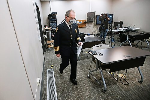 JOHN WOODS / WINNIPEG FREE PRESS
Chief John Lane, Winnipeg Fire and Paramedic Service (WFPS) enters to speak to media to address reports of racism within the WFPS in Winnipeg Wednesday, February 3, 2021. 

Reporter: ?