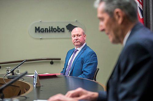 MIKAELA MACKENZIE / WINNIPEG FREE PRESS

Brent Roussin, chief provincial public health officer (left), and premier Brian Pallister speak to the media about possible COVID-19 measure loosening at the Manitoba Legislative Building in Winnipeg on Thursday, Feb. 4, 2021. For Larry Kusch story.

Winnipeg Free Press 2021