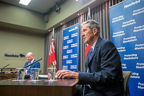 MIKAELA MACKENZIE / WINNIPEG FREE PRESS

Premier Brian Pallister (front) and Brent Roussin, chief provincial public health officer, speak to the media about possible COVID-19 measure loosening at the Manitoba Legislative Building in Winnipeg on Thursday, Feb. 4, 2021. For Larry Kusch story.

Winnipeg Free Press 2021