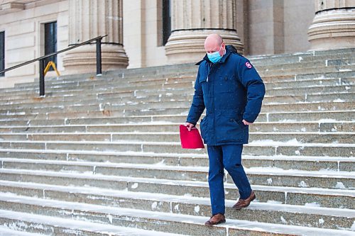 MIKAELA MACKENZIE / WINNIPEG FREE PRESS

Brent Roussin, chief provincial public health officer, walks out of the Manitoba Legislative Building after speaking to the media about possible COVID-19 measure loosening in Winnipeg on Thursday, Feb. 4, 2021. For Larry Kusch story.

Winnipeg Free Press 2021