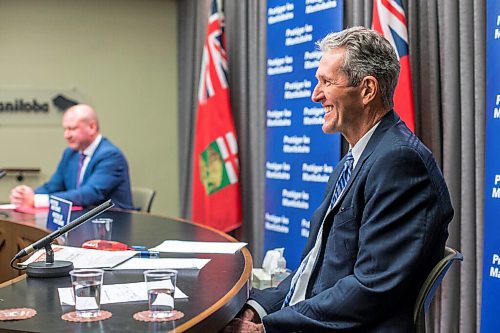 MIKAELA MACKENZIE / WINNIPEG FREE PRESS

Premier Brian Pallister (front) and Brent Roussin, chief provincial public health officer, speak to the media about possible COVID-19 measure loosening at the Manitoba Legislative Building in Winnipeg on Thursday, Feb. 4, 2021. For Larry Kusch story.

Winnipeg Free Press 2021