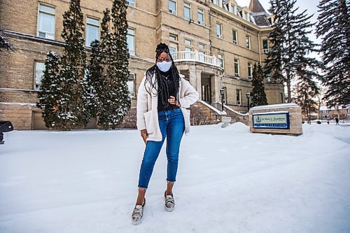 MIKAELA MACKENZIE / WINNIPEG FREE PRESS

Oluwadamilola (Dami) Ojo, whos started a group called Melan Unify for Black youth to connect with resources for professional development, poses for a portrait in front of St. Mary's Academy in Winnipeg on Friday, Feb. 5, 2021. For JS story.

Winnipeg Free Press 2021