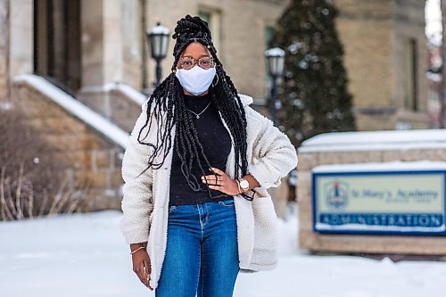 MIKAELA MACKENZIE / WINNIPEG FREE PRESS

Oluwadamilola (Dami) Ojo, whos started a group called Melan Unify for Black youth to connect with resources for professional development, poses for a portrait in front of St. Mary's Academy in Winnipeg on Friday, Feb. 5, 2021. For JS story.

Winnipeg Free Press 2021