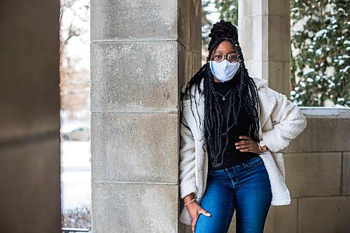 MIKAELA MACKENZIE / WINNIPEG FREE PRESS

Oluwadamilola (Dami) Ojo, whos started a group called Melan Unify for Black youth to connect with resources for professional development, poses for a portrait in front of St. Mary's Academy in Winnipeg on Friday, Feb. 5, 2021. For JS story.

Winnipeg Free Press 2021