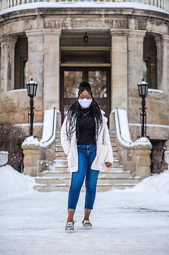 MIKAELA MACKENZIE / WINNIPEG FREE PRESS

Oluwadamilola (Dami) Ojo, whos started a group called Melan Unify for Black youth to connect with resources for professional development, poses for a portrait in front of St. Mary's Academy in Winnipeg on Friday, Feb. 5, 2021. For JS story.

Winnipeg Free Press 2021