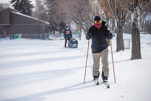 MIKAELA MACKENZIE / WINNIPEG FREE PRESS

Anders Swanson, with Winnipeg Trails, skis ahead to mark out a good loop around the field as Marlow Wilson grooms a path behind at the Minto Athletic Grounds in Winnipeg on Friday, Feb. 5, 2021. For JS story.

Winnipeg Free Press 2021