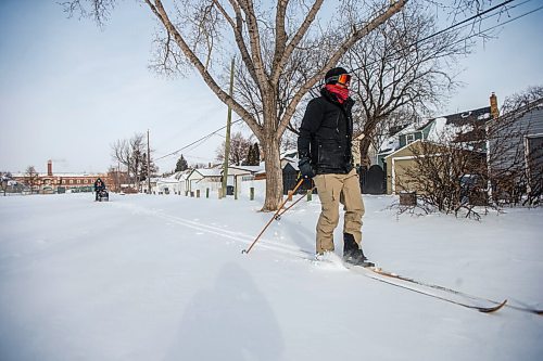 MIKAELA MACKENZIE / WINNIPEG FREE PRESS

Anders Swanson, with Winnipeg Trails, skis ahead to mark out a good loop around the field as Marlow Wilson grooms a path behind at the Minto Athletic Grounds in Winnipeg on Friday, Feb. 5, 2021. For JS story.

Winnipeg Free Press 2021