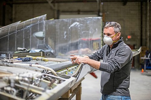 MIKAELA MACKENZIE / WINNIPEG FREE PRESS

Marsh Pettitt shows a wing being worked on from the CL-84 Dunavert at the warehouse where exhibits are being conserved, restored, and prepared for the Western Canadian Aviation Museum (which is slated to open at the old airport in 2022) in Winnipeg on Wednesday, Feb. 3, 2021. Photo page.

Winnipeg Free Press 2021