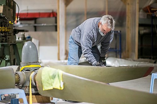 MIKAELA MACKENZIE / WINNIPEG FREE PRESS

Matt Halpin works on restoring propeller at the warehouse where exhibits are being conserved, restored, and prepared for the Western Canadian Aviation Museum (which is slated to open at the old airport in 2022) in Winnipeg on Wednesday, Feb. 3, 2021. Photo page.

Winnipeg Free Press 2021