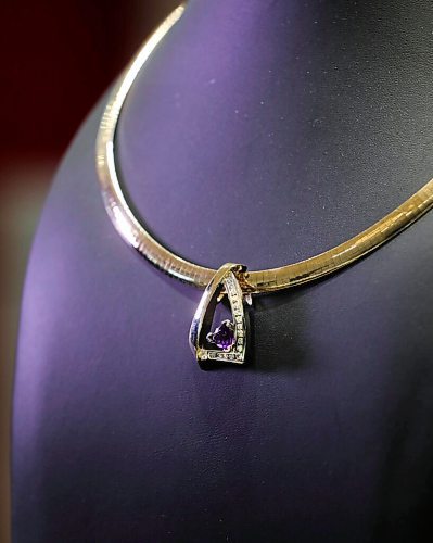 RUTH BONNEVILLE / WINNIPEG FREE PRESS 

LOCAL - Valentine's Day Jewellery 

Photo of amethyst diamond,  pendant and necklace.  Italian design  $7994.00 (price is for both)

Description: VALENTINES DAY DURING PANDEMIC: Engagement ring sales have doubled for some local jewellers as Valentines Day approaches. Joe Nemeth, owner of Nemeth Diamonds said business has come in waves since last March but theyve been busy since opening last week. 



Feb 08, 2021