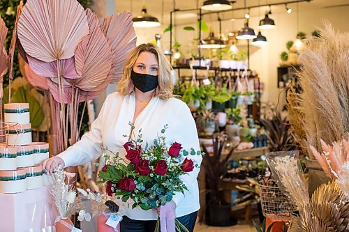 MIKAELA MACKENZIE / WINNIPEG FREE PRESS

Julie Myers, owner of Floral Fixx, poses for a portrait at the shop in Winnipeg on Monday, Feb. 8, 2021. For Nicole story.

Winnipeg Free Press 2021