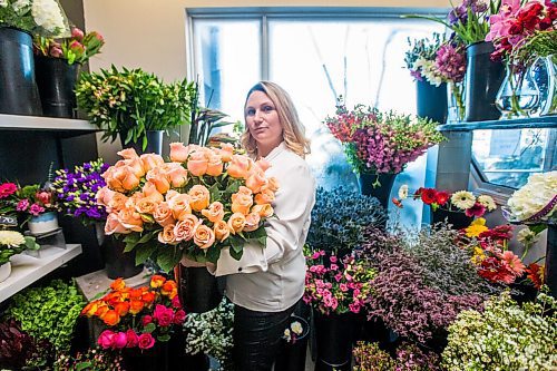 MIKAELA MACKENZIE / WINNIPEG FREE PRESS

Julie Myers, owner of Floral Fixx, poses for a portrait in the flower cooler at the shop in Winnipeg on Monday, Feb. 8, 2021. For Nicole story.

Winnipeg Free Press 2021